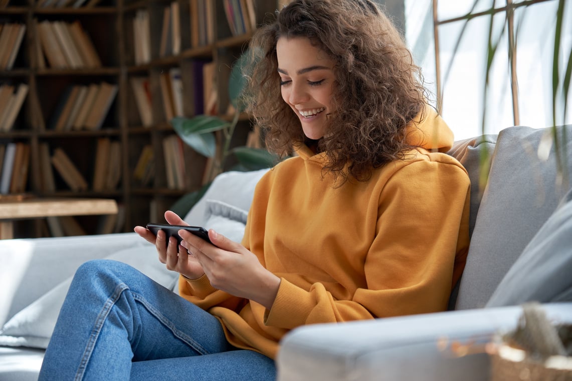 Girl Watching Video Online Using Smartphone